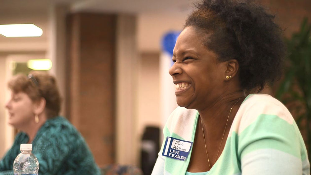 BlueCross employee smiling