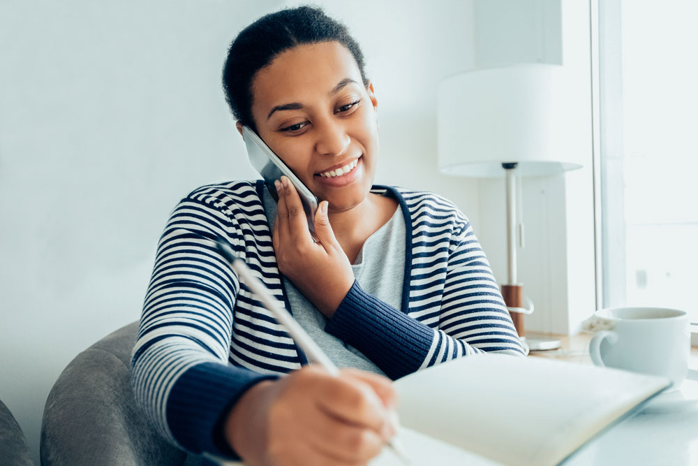 woman talks on phone 