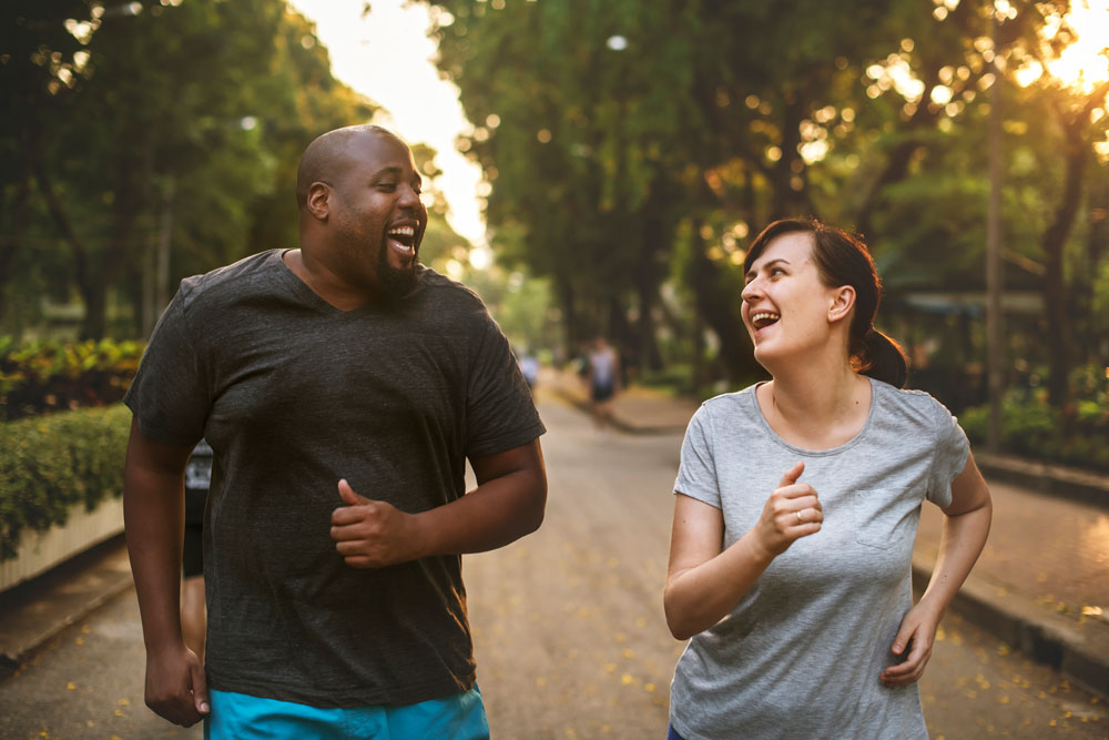 man and woman walking