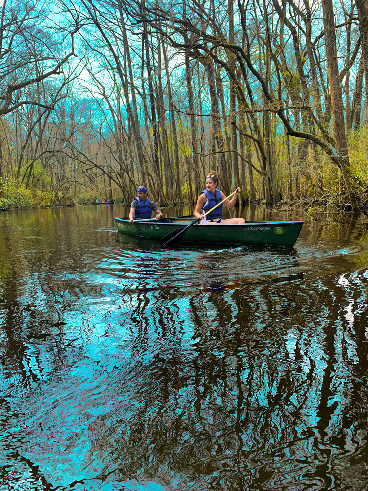 man and woman in canoe on Edisto River