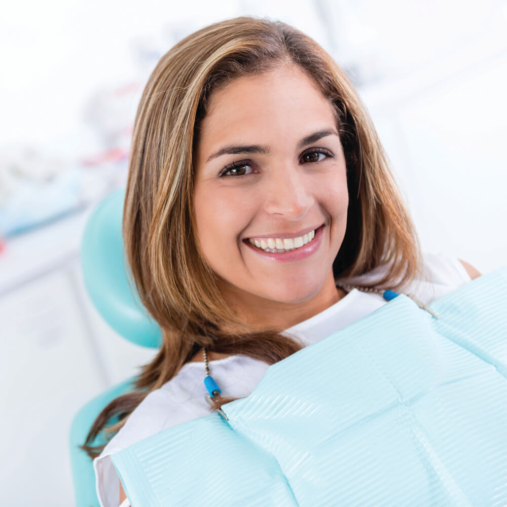 Woman smiling at the dentist office