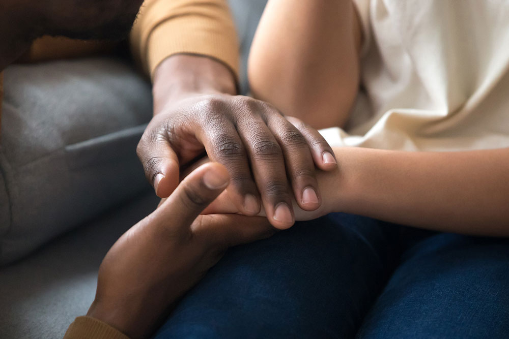 women holding hands