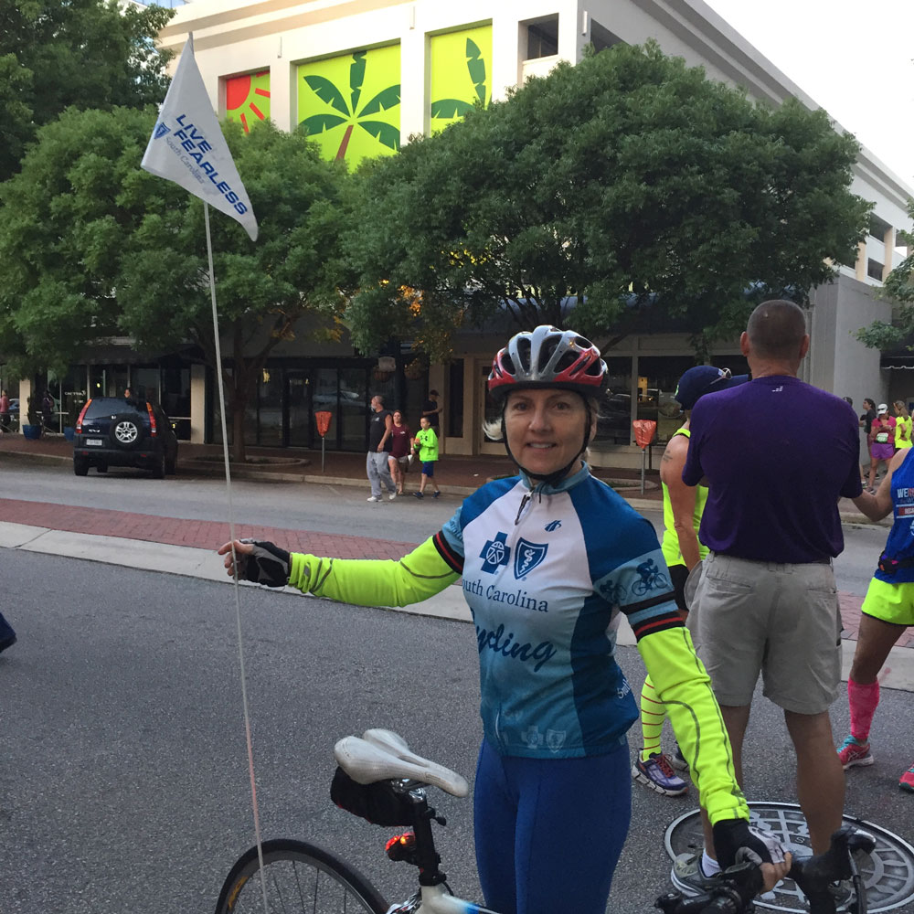 Susan Forrest volunteering at a bike race